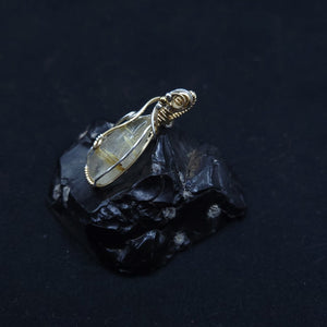 Mixed Metal Rutilated Quartz Pendant