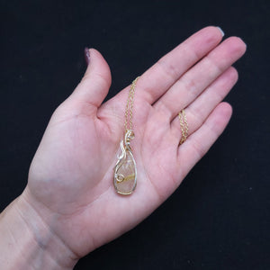 Mixed Metal Rutilated Quartz Pendant