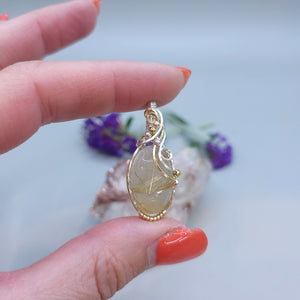 Mixed Metal Rutilated Quartz Pendant