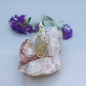 Mixed Metal Rutilated Quartz Pendant